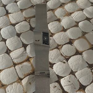 Nixon Silver Mesh Bracelet Watch with Black Dial